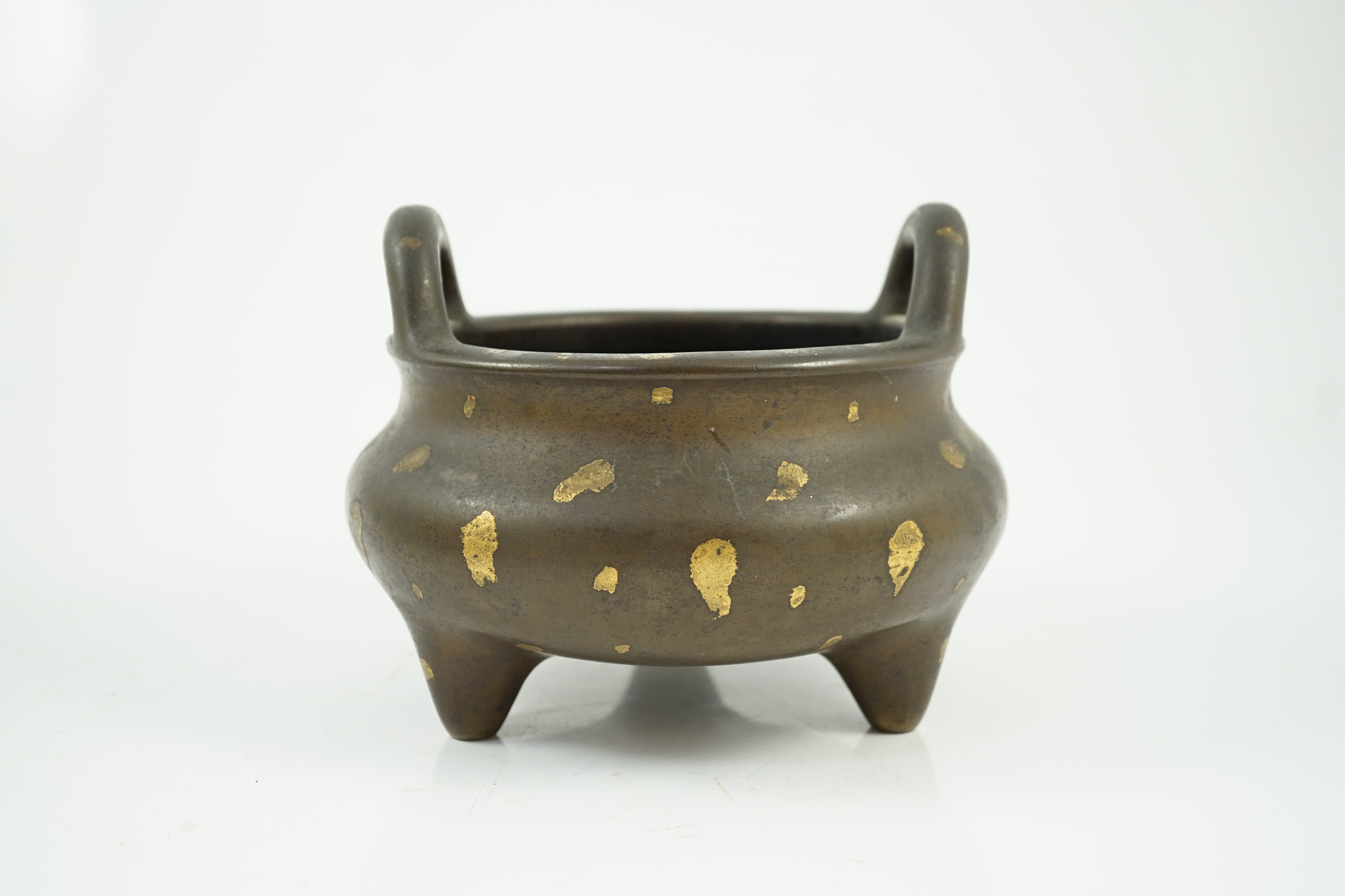 A large Chinese gold-splashed bronze tripod censer, ding, Kangxi period